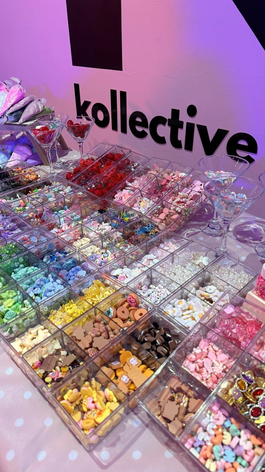 The charm bar set up under the kollective sign
